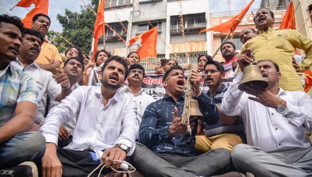 Maratha community members take part in a sit-in protest in Pune on August 2. (Sanket Wankhade/HT) Maratha community members take part in a sit-in protest in Pune on August 2. (Sanket Wankhade/HT)