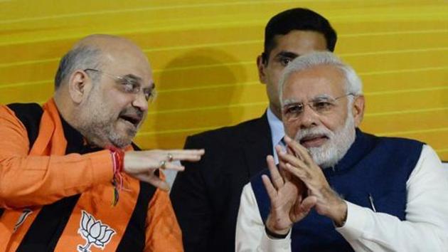 Prime Minister Narendra Modi and BJP party president Amit Shah at the party headquarters in New Delhi.(AFP File Photo) Prime Minister Narendra Modi and BJP party president Amit Shah at the party headquarters in New Delhi.(AFP File Photo)