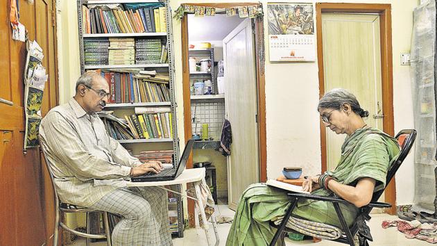 Hyderabad couple GVSP Kumar and his wife E Usha Bala at their room in Varanasi’s Kasivas Dham.(Sanchit Khanna/HT PHOTO)