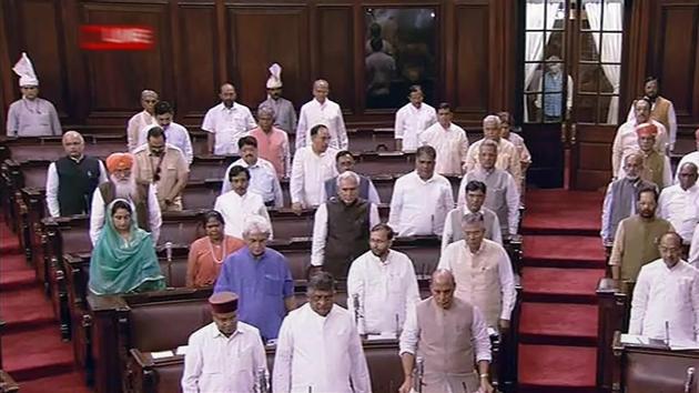 Union Home Minister Rajnath Singh and other ministers and Members stand to observe a silence during an obituary reference in the Rajya Sabha, in New Delhi on Friday, Aug 3, 2018.(PTI)