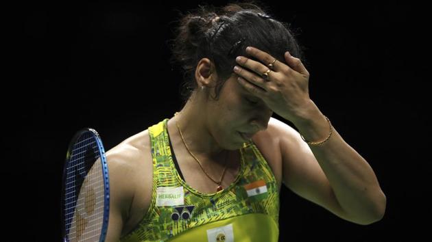 Shutller Saina Nehwal crashed out of the Badminton World Championship after going down against her Spanish opponent Carolina Marin in the quarter-final clash of the women’s singles event here on Friday. The former world number one slumped to 6-21, 11-21 straight set defeat in the match that lasted 31 minutes. (Mark Schiefelbein / AP) Shutller Saina Nehwal crashed out of the Badminton World Championship after going down against her Spanish opponent Carolina Marin in the quarter-final clash of the women’s singles event here on Friday. The former world number one slumped to 6-21, 11-21 straight set defeat in the match that lasted 31 minutes. (Mark Schiefelbein / AP)