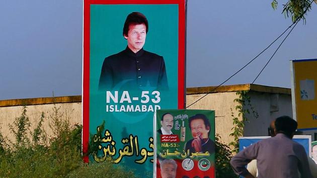 A portrait of Imran Khan, head of the Pakistan Tehreek-e-Insaf party, is on display near Khan's residence, in Islamabad, Pakistan.(AP File Photo) A portrait of Imran Khan, head of the Pakistan Tehreek-e-Insaf party, is on display near Khan's residence, in Islamabad, Pakistan.(AP File Photo)
