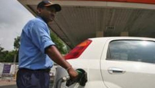 A worker fills a car with diesel. A 2016 study had stated that vehicles contribute heavily to at least two of Delhi’s most potent pollutants in the air – PM2.5 and NO2 (Representative Image) (Reuters File Photo) A worker fills a car with diesel. A 2016 study had stated that vehicles contribute heavily to at least two of Delhi’s most potent pollutants in the air – PM2.5 and NO2 (Representative Image) (Reuters File Photo)