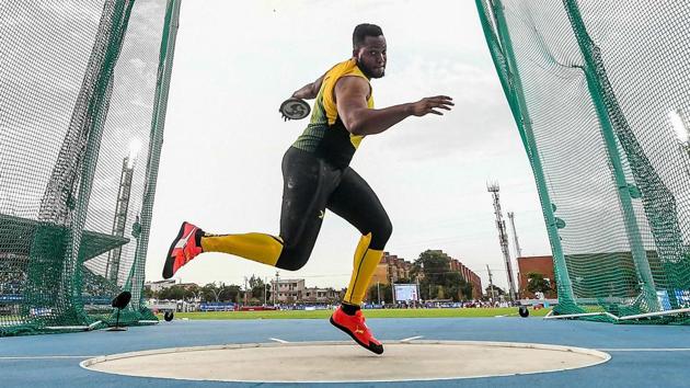 Jamaica’s Travis Smikle competes in the Men’s Disc Throw final event during the 2018 Central American and Caribbean Games (CAC), in Barranquilla, Colombia. (Luis Acosta / AFP) Jamaica’s Travis Smikle competes in the Men’s Disc Throw final event during the 2018 Central American and Caribbean Games (CAC), in Barranquilla, Colombia. (Luis Acosta / AFP)