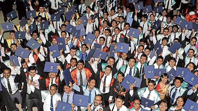 There are 20 IIMs in the country and all are likely to benefit from the move to allow them to admit students directly for PhD after completing four year graduation or professional courses.(HT File Photo)