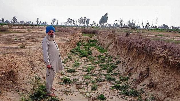 The land of Janer village has been laid waste due to rampant illegal mining from 2014-16, a state government inquiry report had found. (HT photo) The land of Janer village has been laid waste due to rampant illegal mining from 2014-16, a state government inquiry report had found. (HT photo)