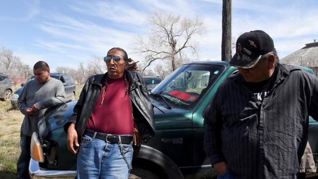 At the Pine Ridge Reservation Dave Swallow (C), an elder and headsman of the Oglala Lakota Nation explained: “We may be poor in the white man’s way but we are not poor in the Lakota, Dakota and Nakota ways because we are connected to this earth and connected to above and everywhere.” (Stephanie Keith / REUTERS)