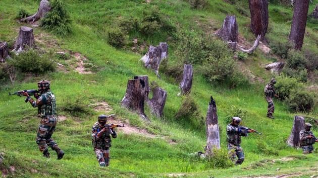 A police spokesman said the encounter took place in an open area after the militants, who were in hiding, took advantage of the darkness and came out of the house where they had been holed up and sprayed gunfire on the security forces.(PTI photo)