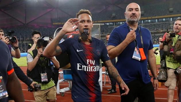 Paris Saint Germain's Neymar celebrates after winning the French Super Cup.(REUTERS)