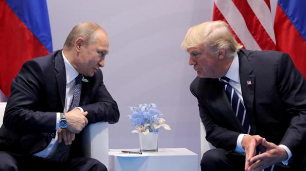 Russia's President Vladimir Putin talks to US President Donald Trump during their bilateral meeting at the G20 summit in Hamburg, Germany.(REUTERS File Photo)