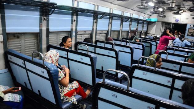 Passengers keep their legs on the seat as they don't have much legroom in the coaches of Ladies compartment with season ticket on Deccan Queen express in Pune. (Shankar Narayan/HT PHOTO) Passengers keep their legs on the seat as they don't have much legroom in the coaches of Ladies compartment with season ticket on Deccan Queen express in Pune. (Shankar Narayan/HT PHOTO)