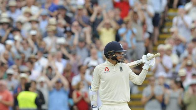 England's Sam Curran acknowledges the crowd after scoring fifty runs during the third day of the first test cricket match. (AP)