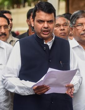 Maharashtra Chief Minister Devendra Fadnavis along with party leaders interact with the media after an all-party meeting to discuss the Maratha reservation issue, in Mumbai(Shashank Parade/PTI)