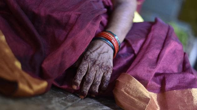 A detail of mehndi applied to hand of Saraswati Aggarwal who came to live in Mumukshu Bhavan. The stay at Mukti Bhavan is free. The visitor must have an attendant, and can take a room for a maximum of 15 days, after which Shukla decides whether to extend the stay or not depending on the person’s health and the availability of rooms. Other facilities meant for moksharthis have different terms and conditions. (Sanchit Khanna / HT Photo) A detail of mehndi applied to hand of Saraswati Aggarwal who came to live in Mumukshu Bhavan. The stay at Mukti Bhavan is free. The visitor must have an attendant, and can take a room for a maximum of 15 days, after which Shukla decides whether to extend the stay or not depending on the person’s health and the availability of rooms. Other facilities meant for moksharthis have different terms and conditions. (Sanchit Khanna / HT Photo)