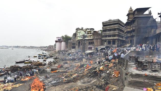 A view of Manikarnika Ghat at Varanasi in Uttar Pradesh. In the Hindu belief system, dying in Kashi, the older part of Varanasi city, along the banks of Ganga, is associated with moksha or mukti – liberation from the cycle of life and death. This is what has motivated the devout to go to Varanasi in their last days. Or last years, in many cases. (Sanchit Khanna / HT Photo) A view of Manikarnika Ghat at Varanasi in Uttar Pradesh. In the Hindu belief system, dying in Kashi, the older part of Varanasi city, along the banks of Ganga, is associated with moksha or mukti – liberation from the cycle of life and death. This is what has motivated the devout to go to Varanasi in their last days. Or last years, in many cases. (Sanchit Khanna / HT Photo)