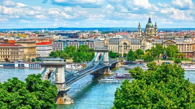 Budapest, Hungary: This city is home to various forms of architecture, ranging from Neoclassical to Baroque and Art Nouveau. There are good homestay options apart from hotels which can help you save money. The roadside eateries are also cheaper. Entry charges at tourist spots are minimal and you can walk to most sites. (Shutterstock) Budapest, Hungary: This city is home to various forms of architecture, ranging from Neoclassical to Baroque and Art Nouveau. There are good homestay options apart from hotels which can help you save money. The roadside eateries are also cheaper. Entry charges at tourist spots are minimal and you can walk to most sites. (Shutterstock)
