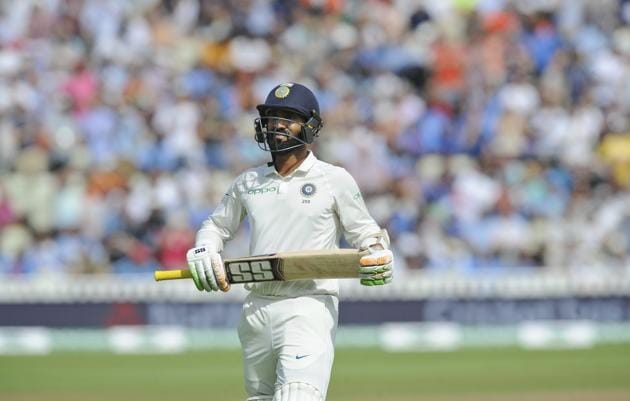 India's Dinesh Karthik leaves the field after being dismissed during the fourth day of the first test cricket match between England and India. (AP)