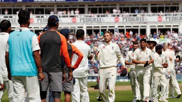 England's Joe Root shakes hands with India's Virat Kohli at the end of the match. (REUTERS)