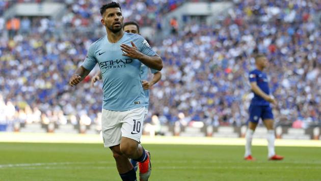 Manchester City's Argentinian striker Sergio Aguero celebrates after scoring their second goal during the English FA Community Shield football match between Chelsea and Manchester City at Wembley Stadium in north London on August 5, 2018.(AFP)