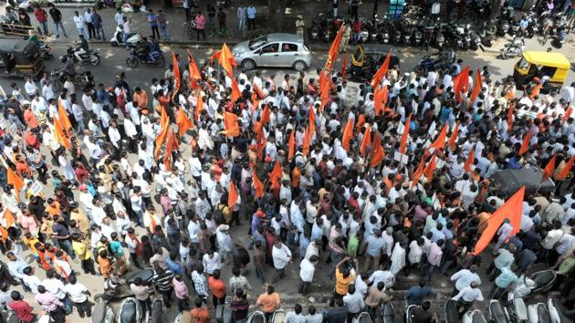 Maratha community members during a protest march for reservation on JM road on Sunday. (HT PHOTO)