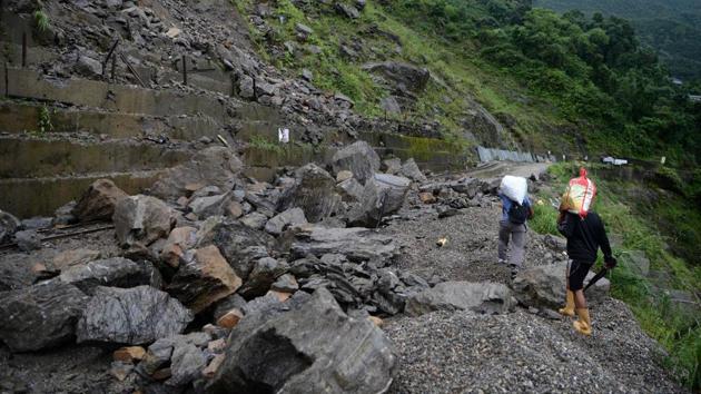 A man in Thati Bazaar was rescued while his wife and three daughters were killed when their house was swept away, officials said.(AFP/Picture for representation) A man in Thati Bazaar was rescued while his wife and three daughters were killed when their house was swept away, officials said.(AFP/Picture for representation)