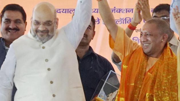 BJP president Amit Shah and Uttar Pradesh chief minister Yogi Adityanath at the event to rename Mughalsarai railway junction to Pandit Deen Dayal Upadhyay Junction, in Mughalsarai on Sunday. (PTI) BJP president Amit Shah and Uttar Pradesh chief minister Yogi Adityanath at the event to rename Mughalsarai railway junction to Pandit Deen Dayal Upadhyay Junction, in Mughalsarai on Sunday. (PTI)