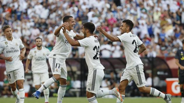 Marco Asensio #20 of Real Madrid celebrates with his teammates after scoring a goal against Juventus in the second half during the International Champions Cup 2018 at FedExField on August 4, 2018 in Landover, Maryland.(AFP)