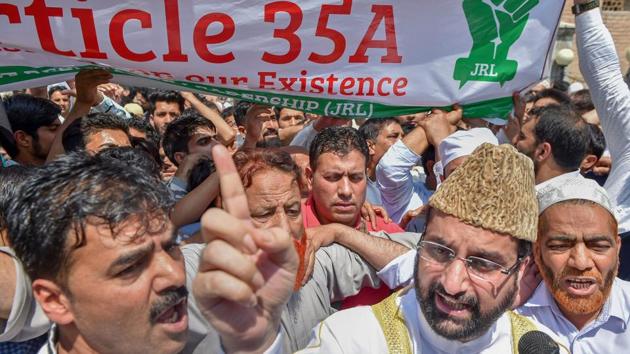 Hurriyat Conference (moderate faction) chairman of Mirwaiz Umar Farooq leads a protest against the petitions filed in the Supreme Court challenging the validity of Article 35 A, in Srinagar on Friday.(PTI)