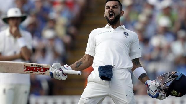 India's Captain Virat Kohli celebrates his century on the second day of the first Test cricket match between England and India at Edgbaston.(AFP)