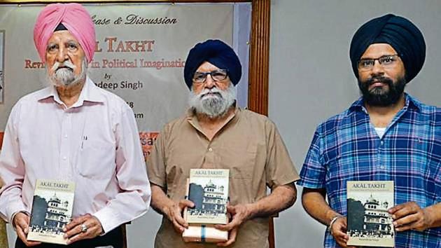 (From left) Agricultural economist and Central University of Punjab chancellor Sardara Singh Johl, former JNU professor Harjit Singh Gill and US-based Sikh scholar Amandeep Singh during the release of the latter’s book in Amritsar on Sunday. (HT Photo) (From left) Agricultural economist and Central University of Punjab chancellor Sardara Singh Johl, former JNU professor Harjit Singh Gill and US-based Sikh scholar Amandeep Singh during the release of the latter’s book in Amritsar on Sunday. (HT Photo)