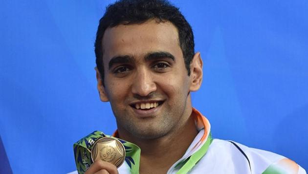 India's Sandeep Sejwal poses with his bronze medal on the podium during the victory ceremony for the men's 50m breaststroke swimming event during the 17th Asian Games at the Munhak Park Tae-hwan Aquatics Centre in Incheon on September 26, 2014.(AFP/Getty Images) India's Sandeep Sejwal poses with his bronze medal on the podium during the victory ceremony for the men's 50m breaststroke swimming event during the 17th Asian Games at the Munhak Park Tae-hwan Aquatics Centre in Incheon on September 26, 2014.(AFP/Getty Images)