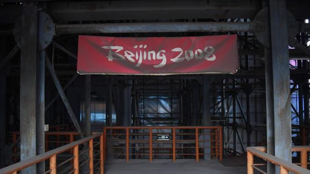A faded Beijing 2008 sign is seen in the grandstand of the beach volleyball stadium. Beijing used the games to send a message: decades of reform and growth had made it rich and powerful enough to spend billions staging a dazzling and deftly organised sports spectacle. (Greg Baker / AFP) A faded Beijing 2008 sign is seen in the grandstand of the beach volleyball stadium. Beijing used the games to send a message: decades of reform and growth had made it rich and powerful enough to spend billions staging a dazzling and deftly organised sports spectacle. (Greg Baker / AFP)