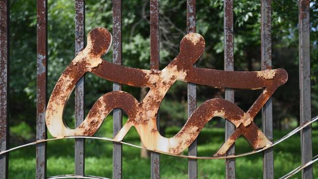 A rusted logo on the fence of the canoeing and rowing venue. But those who hoped the Games would lead to positive political change in China have largely been disappointed, said Zhouxiang Lu, an expert on the intersection of sports and politics at Ireland’s Maynooth University. (Greg Baker / AFP) A rusted logo on the fence of the canoeing and rowing venue. But those who hoped the Games would lead to positive political change in China have largely been disappointed, said Zhouxiang Lu, an expert on the intersection of sports and politics at Ireland’s Maynooth University. (Greg Baker / AFP)