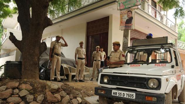 Policemen at the scene of firing incident at Tigra in Sector 57, Gurugram. Four police teams have been set up to nab the accused. (Parveen Kumar/ HT Photo) Policemen at the scene of firing incident at Tigra in Sector 57, Gurugram. Four police teams have been set up to nab the accused. (Parveen Kumar/ HT Photo)