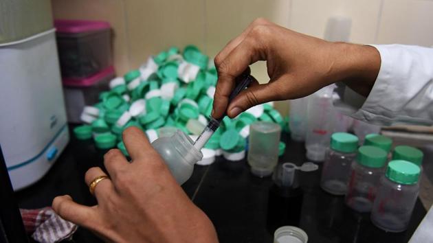 A nurse extracts breast milk from a bottle before checking its quality at Fortis La Femme hospital. The Amaara facility collects breast milk from donor women who pump it at home. It is then pasteurised and provided to newborns in hospital or to mothers unable to breastfeed. A report released by UNICEF and the WHO ahead of World Breastfeeding Week underscored the benefits of nursing babies. (Sajjad Hussain / AFP) 