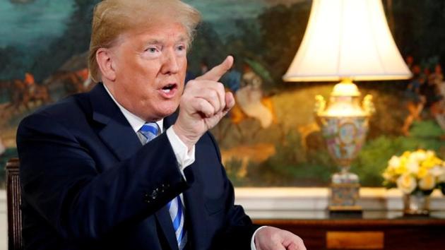 US President Donald Trump speaks to reporters after signing a proclamation declaring his intention to withdraw from the JCPOA Iran nuclear agreement in the Diplomatic Room at the White House in Washington, US May 8, 2018.(Reuters File Photo)