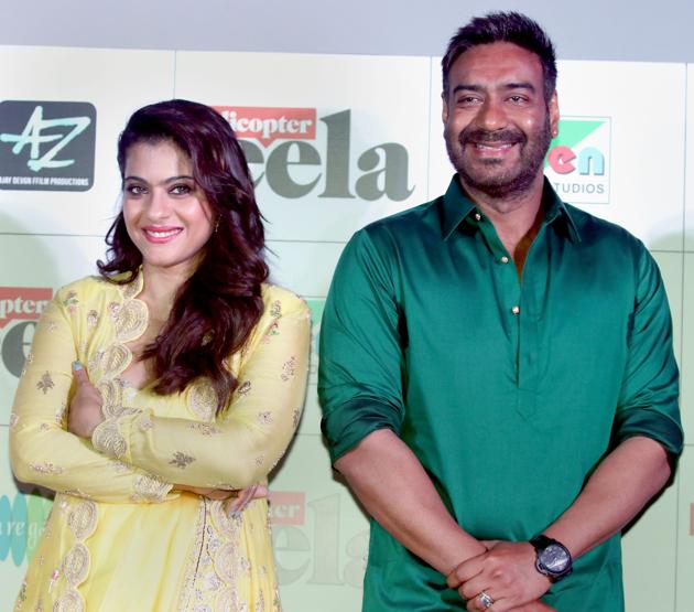 Kajol Devgn and Ajay Devgn pose for a picture as they celebrate the formers 43rd birthday during the trailer launch of their upcoming Hindi film Helicopter Eela.(PTI)