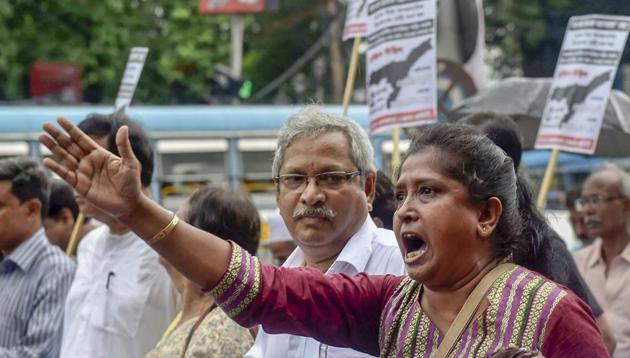 Communist Party of India (Marxist) activists take part in a protest rally against the Assam's National Register of Citizen draft, Kolkata, August 5, 2018(PTI)