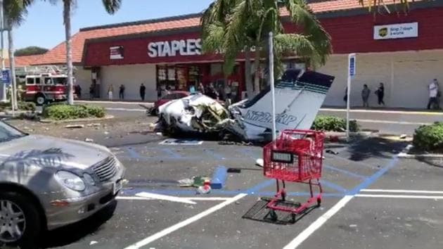 The debris of a plane which crashed into a parking lot is seen in Santa Ana, California on August 5. (REUTERS) The debris of a plane which crashed into a parking lot is seen in Santa Ana, California on August 5. (REUTERS)