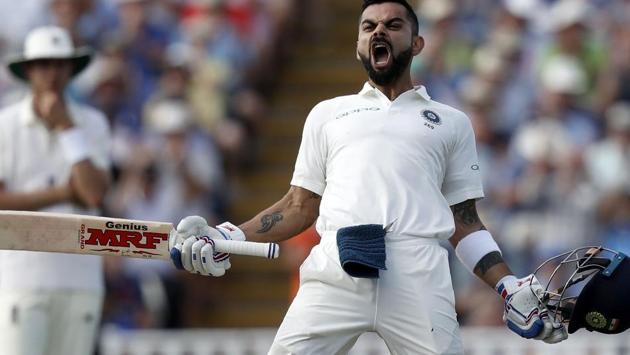India's Captain Virat Kohli celebrates his century on the second day of the first Test cricket match between England and India at Edgbaston in Birmingham, central England on August 2, 2018.(AFP)