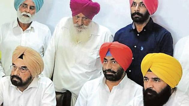 Garhshankar MLA Jai Krishan Singh Rodi (right) with AAP legislators Sukhpal Khaira and Kanwar Sandhu at a press conference in Chandigarh on Monday. (HT Photo) Garhshankar MLA Jai Krishan Singh Rodi (right) with AAP legislators Sukhpal Khaira and Kanwar Sandhu at a press conference in Chandigarh on Monday. (HT Photo)