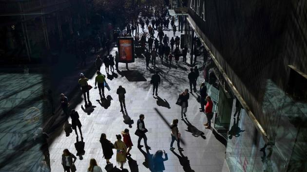 People walk on a pedestrian street in the central business district of Sydney on August 7. (AFP Photo) People walk on a pedestrian street in the central business district of Sydney on August 7. (AFP Photo)