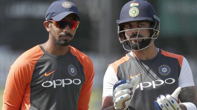 India's Jasprit Bumrah, left, speaks to his captain Virat Kohli. (AP) India's Jasprit Bumrah, left, speaks to his captain Virat Kohli. (AP)