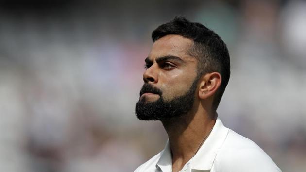 India's Virat Kohli walks back to the pavilion after losing his wicket for 51 during play on the fourth day of the first Test cricket match between England and India at Edgbaston in Birmingham(AFP)