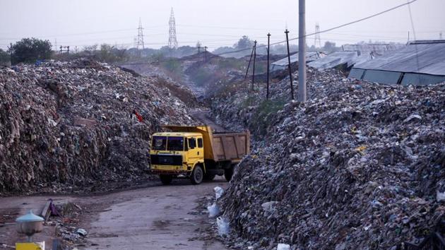 The Supreme Court on Monday said that Delhi was facing an “emergency situation” due to mountains of garbage as it expressed dissatisfaction over the response of authorities on waste management. The court fumed and said that people have every right to question the decision and even went on to say that the civic body should dump the “waste on the Raj Niwas Marg”, where Delhi lieutenant governor’s official residence is located. (Adnan Abidi / REUTERS File) 
