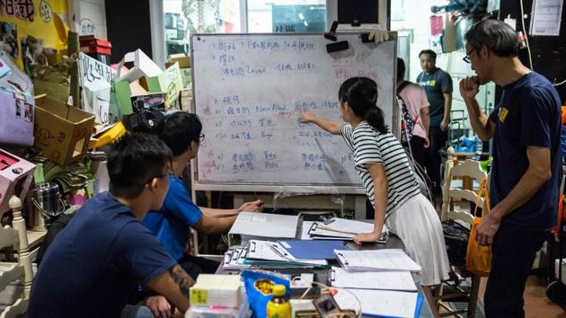 The volunteers prioritise repair jobs at their headquarters. The group was formed by activists who ran a recycling operation at protest camps set up during the 2014 Umbrella Movement rallies in Hong Kong. The rallies failed to win reform and since then activists have been prosecuted on protest-related charges and disqualified from the legislature, denting the democracy campaign. (Isaac Lawrence / AFP)