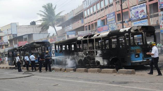 Police have booked around 4,000 persons for the violence during the Maratha agitation on July 30. As many as 100 vehicles were damaged, 30 of them torched, during the Maratha protest that turned violent. (HT FILE PHOTO) Police have booked around 4,000 persons for the violence during the Maratha agitation on July 30. As many as 100 vehicles were damaged, 30 of them torched, during the Maratha protest that turned violent. (HT FILE PHOTO)