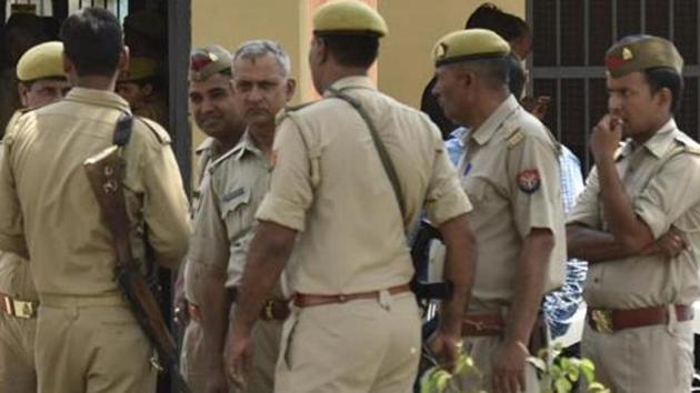 Uttar Pradesh police investigate the murders of a woman and her three daughters (photo is representative). (Virendra Singh Gosain/HT File Photo) Uttar Pradesh police investigate the murders of a woman and her three daughters (photo is representative). (Virendra Singh Gosain/HT File Photo)