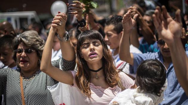 An estimated 10-12 million devotees across the Americas, and particularly in culturally Catholic Mexico, make the Santa Muerte movement the fastest-growing of its kind in the region, according to Andrew Chesnut, chair of Catholic studies at Virginia Commonwealth University and the author of Devoted to Death: Santa Muerte, the Skeleton Saint. (Pedro Pardo / AFP)