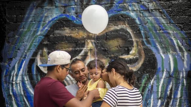 Many practices of worship centred on the saint – prayers, rosaries and candles –are reminiscent of mainstream Catholic tradition. Santa Muerte herself resembles in her pose and appearance, albeit stripped of skin, the Virgin of Guadalupe. This and her open stance towards those shunned by other Churches on the basis of sexuality, denomination, race or other markers only makes turning to here easier for potentials. (Pedro Pardo / AFP)